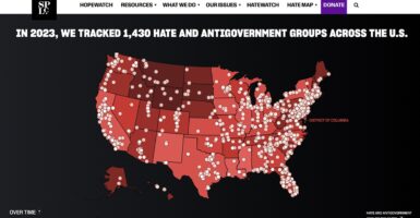 A map of the U.S. in red with little white dots