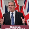 Keir Starmer behind a podium.