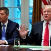 Donald Trump and Sean Duffy sit next to each other in the White House.