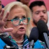 Rep. Debby Dingell, D-Mich., wearing blue attire and matching glasses
