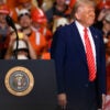 President Donald Trump speaks to steelworker supporters wearing hard hats and orange vests on May 30 in West Mifflin, Pennsylvania.