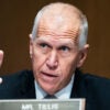 Sen. Thom Tillis, R-N.C., gestures during a committee hearing.