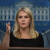 Press secretary Karoline Leavitt signals with her right hand during White House press briefing.